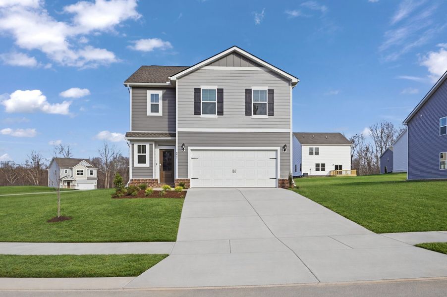 Front exterior of a new home in Pleasant Grove Farms, Westmoreland, TN, highlighting curb appeal (Image 1). Front exterior of a new home in Pleasant Grove Farms, Westmoreland, TN, highlighting curb appeal (Image 1).