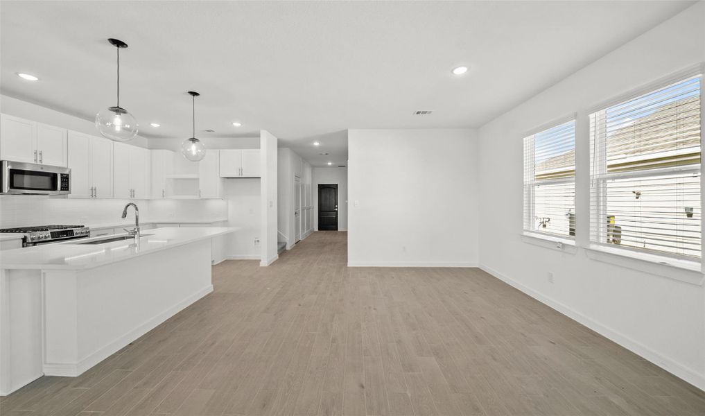 Sun-lit dining area (*Photo not of actual home and used for illustration purposes only.)