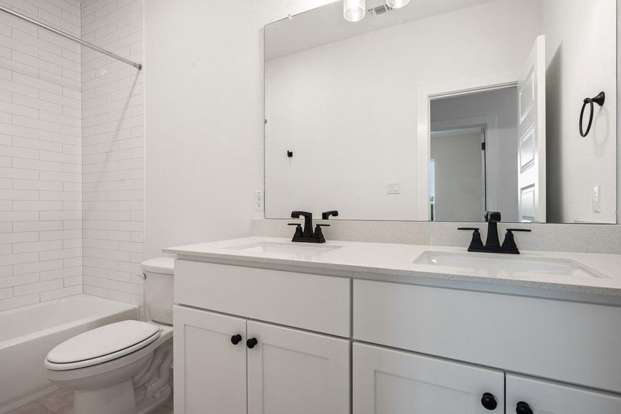 Furnished interior view inside a new home in Heritage, Dripping Springs (Image 15).