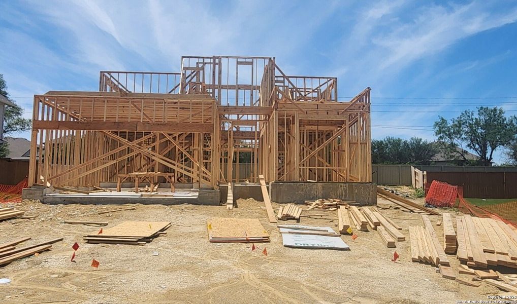 Front exterior of a new home in Foxbrook, Cibolo, TX, highlighting curb appeal (Image 2).