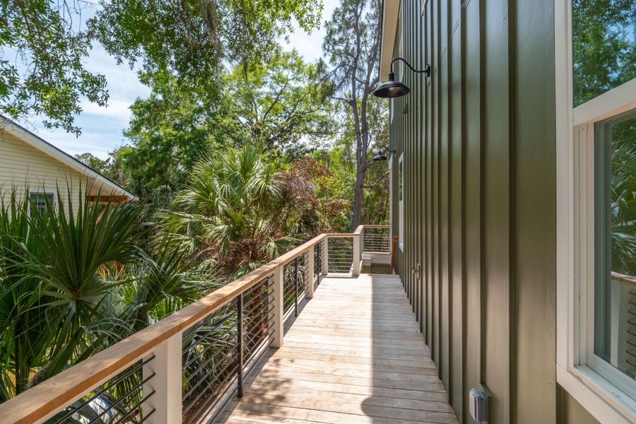 Exterior details and patio area of a home in , Edisto Island (Image 32).