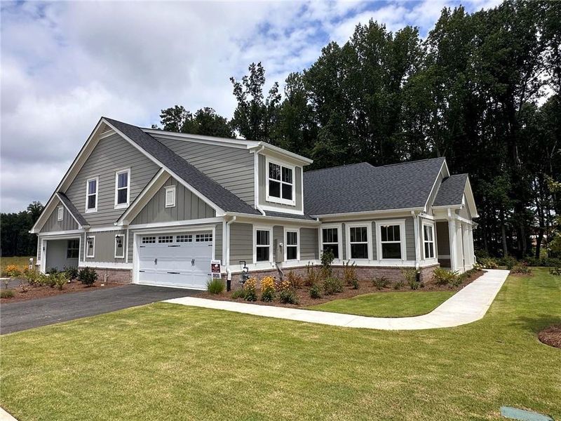 Front exterior of a new home in , Cumming, GA, highlighting curb appeal (Image 2). Front exterior of a new home in , Cumming, GA, highlighting curb appeal (Image 2).