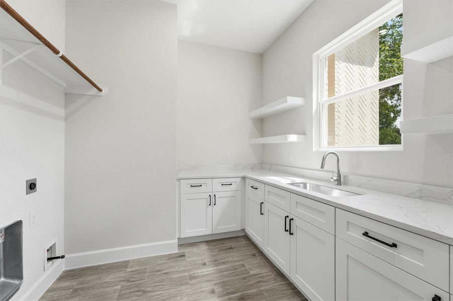 Furnished interior view inside a new home in , Roman Forest (Image 12).