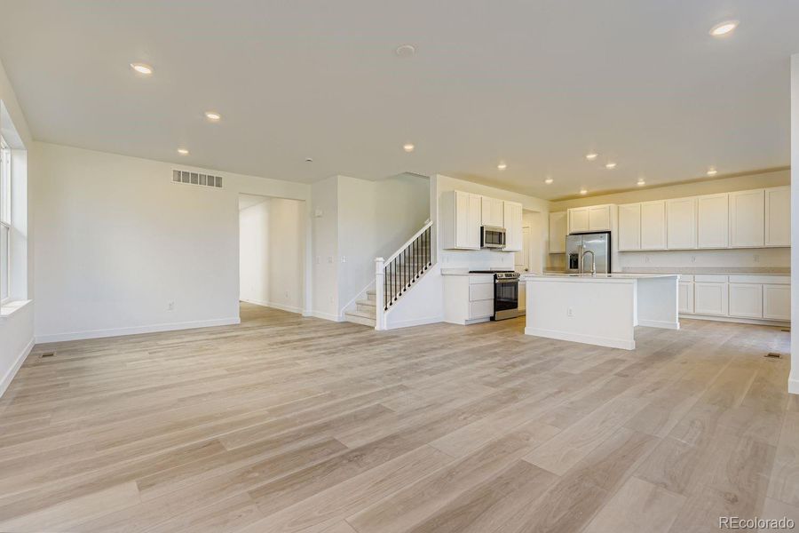 Spacious, unfurnished interior of a new home in Vermilion Creek: The Pioneer Collection, Centennial (Image 9).