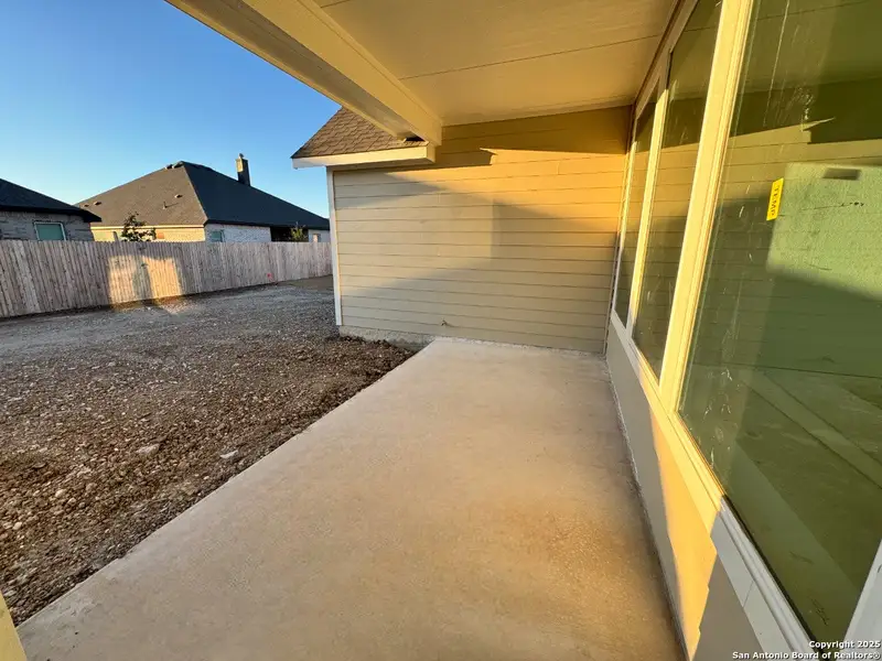 Exterior details and patio area of a home in , Castroville (Image 6).