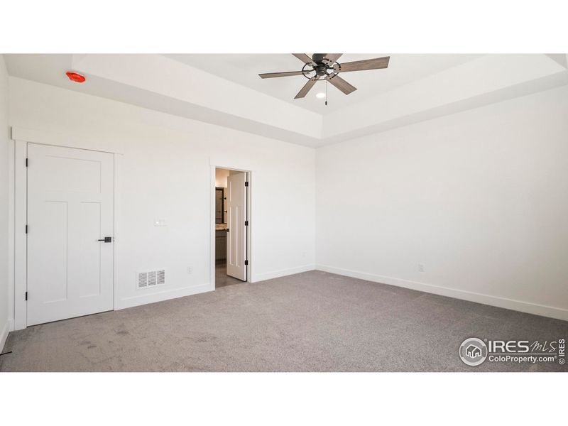 Expansive main level primary bedroom Expansive main level primary bedroom