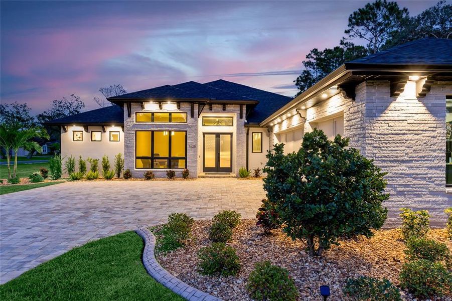 Front exterior of a new home in , New Smyrna Beach, FL, highlighting curb appeal (Image 2). Front exterior of a new home in , New Smyrna Beach, FL, highlighting curb appeal (Image 2).