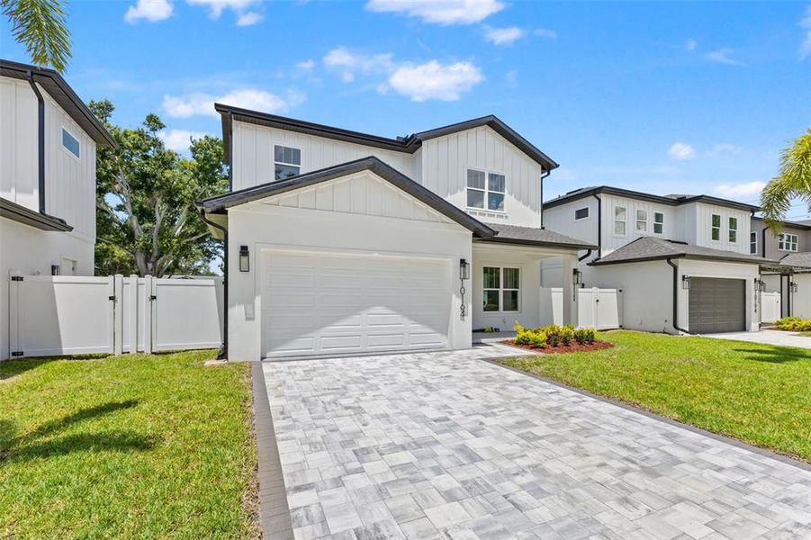 Front exterior of a new home in , Seminole, FL, highlighting curb appeal (Image 27). Front exterior of a new home in , Seminole, FL, highlighting curb appeal (Image 27).