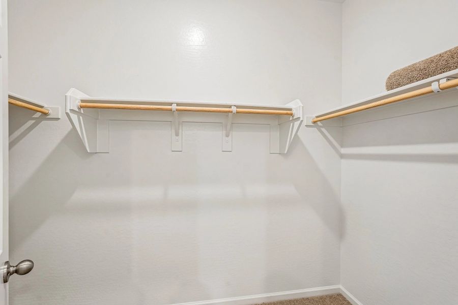 Primary walk in closet Primary walk in closet