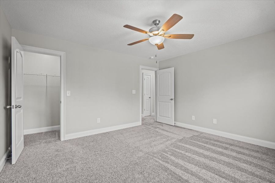 Representative unfurnished interior of a home built from the Enory by Enchanted Homes in Guadalupe Heights, Seguin (Image 40).