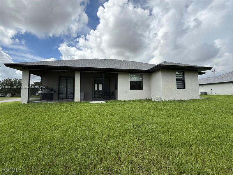 Exterior details and patio area of a home in , Lehigh Acres (Image 1).