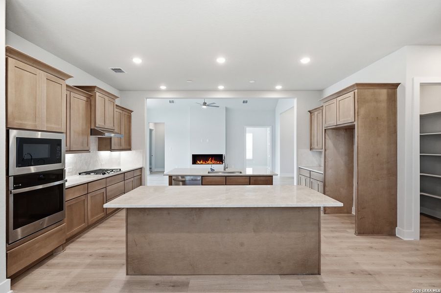 Furnished interior view inside a new home in Potranco Oaks, Castroville (Image 19).