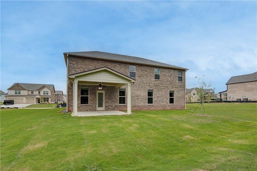 Exterior details and patio area of a home in Kingston, Locust Grove (Image 17).