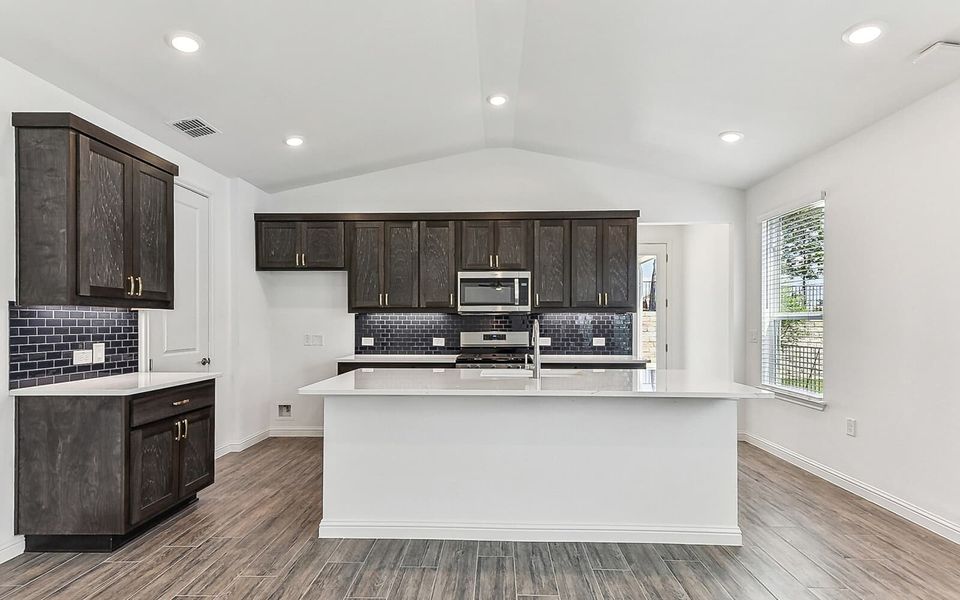 Representative furnished interior of a home built from the Newberry by Brookfield Residential in Traditional at Kissing Tree, San Marcos (Image 7).