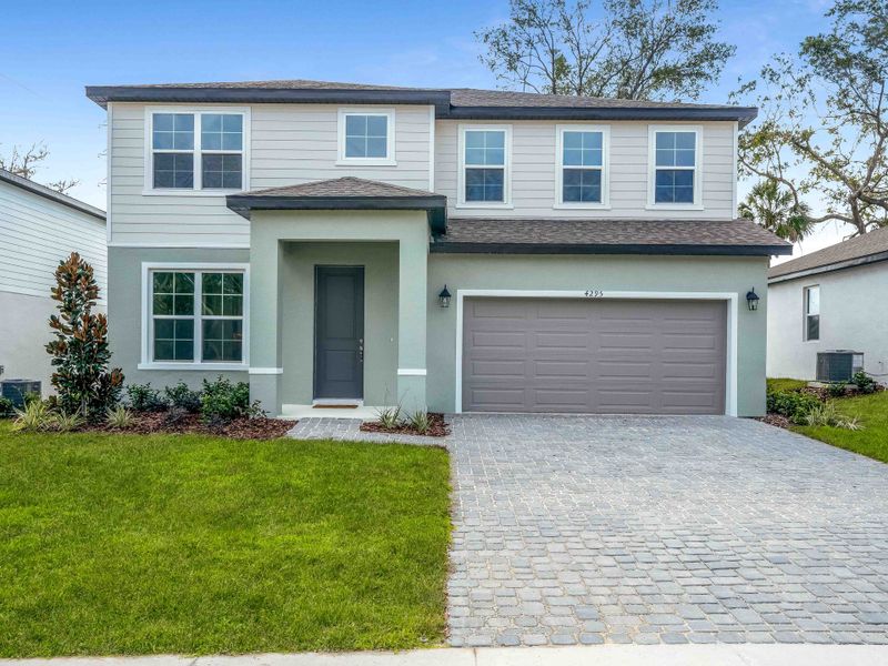 Representative exterior photo of a completed home built from the Florence by Hartizen Homes in Estes Reserve, Eustis, FL (Image 26).