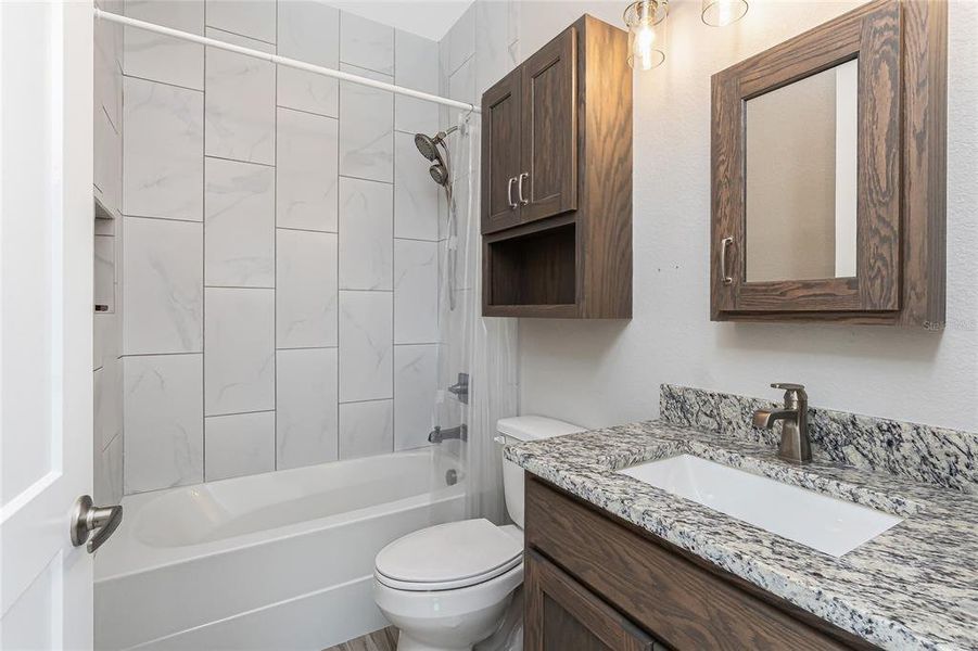 Furnished interior view inside a new home in , Port Charlotte (Image 35).