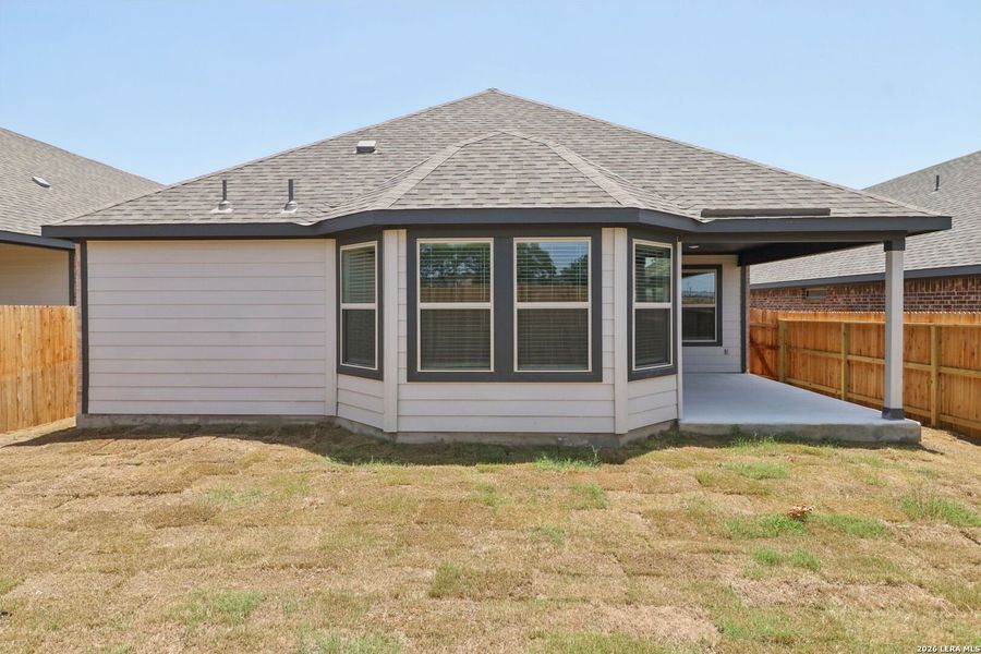 Exterior details and patio area of a home in Kallison Ranch, San Antonio (Image 26).