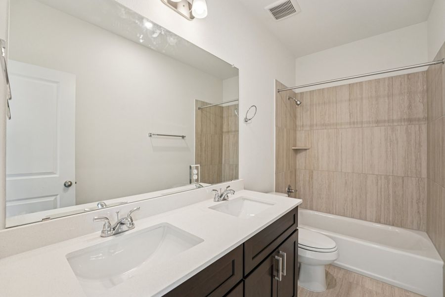 Furnished interior view inside a new home in Sage Hollow, Kyle (Image 8). Furnished interior view inside a new home in Sage Hollow, Kyle (Image 8).