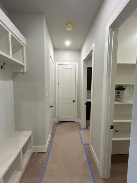 Mudroom featuring baseboards