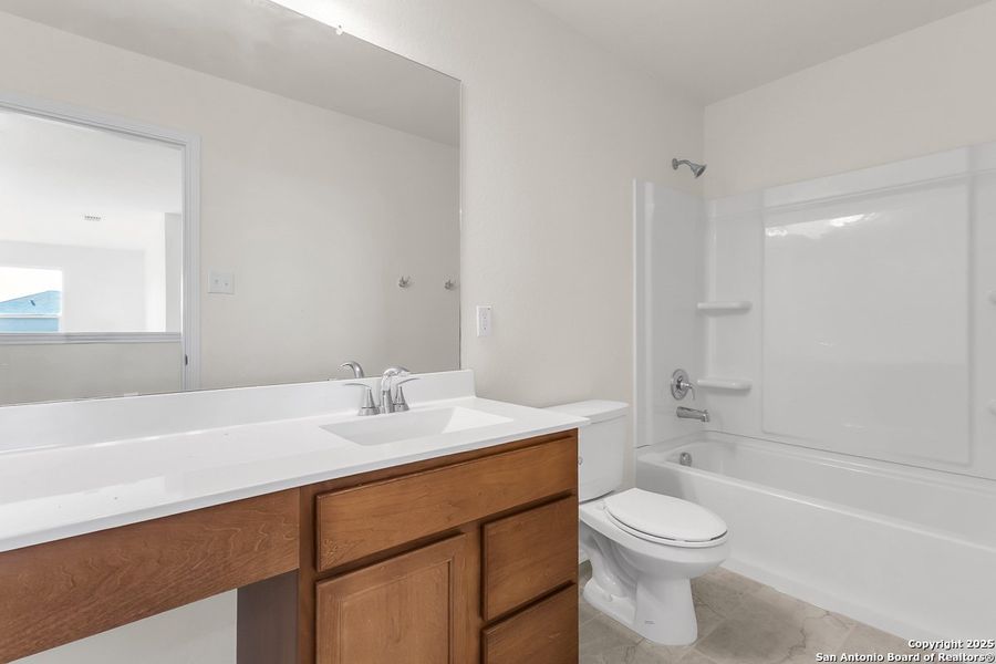 Furnished interior view inside a new home in Medina Crossing, Von Ormy (Image 5).