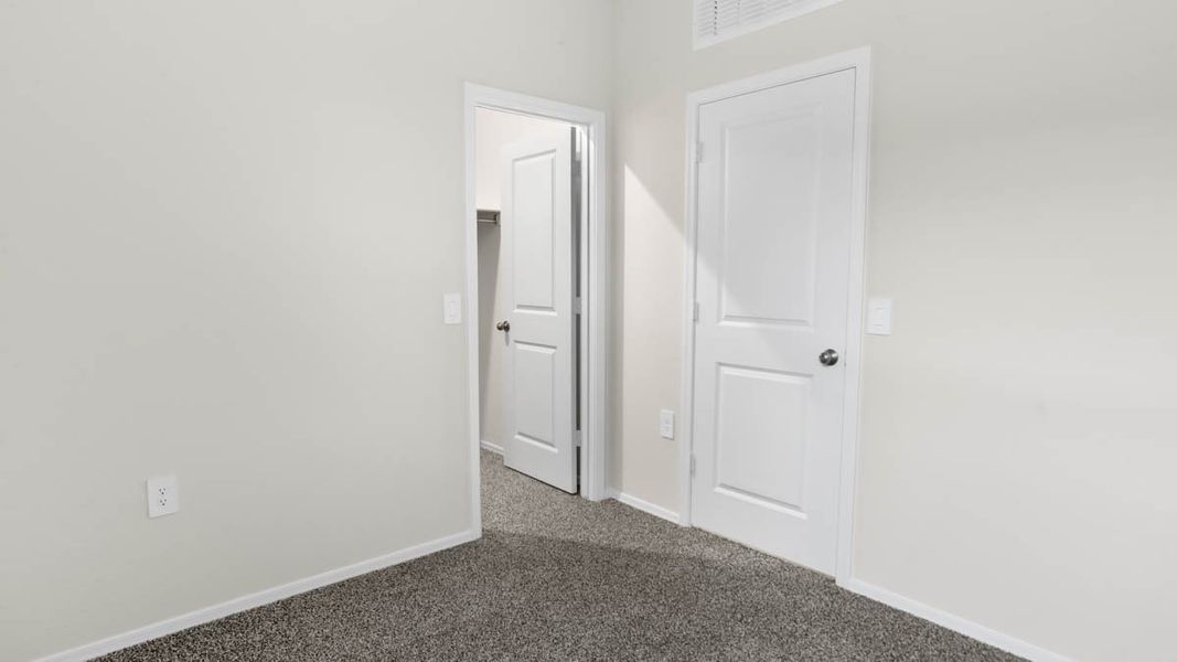 Representative unfurnished interior of a home built from the McCormick by D.R. Horton in Rio Rancho Estates, Surprise (Image 26).