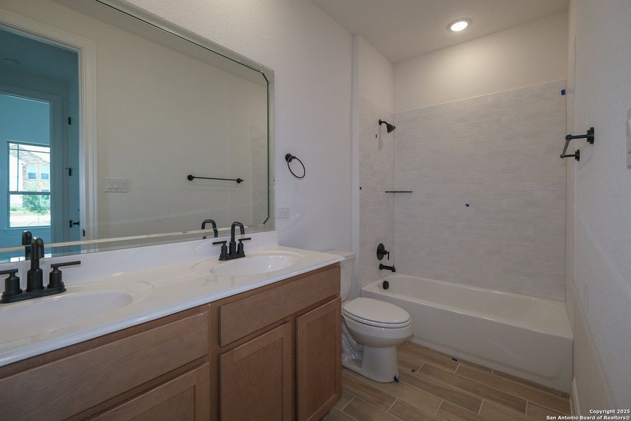 Furnished interior view inside a new home in Everly Estates, San Antonio (Image 9).