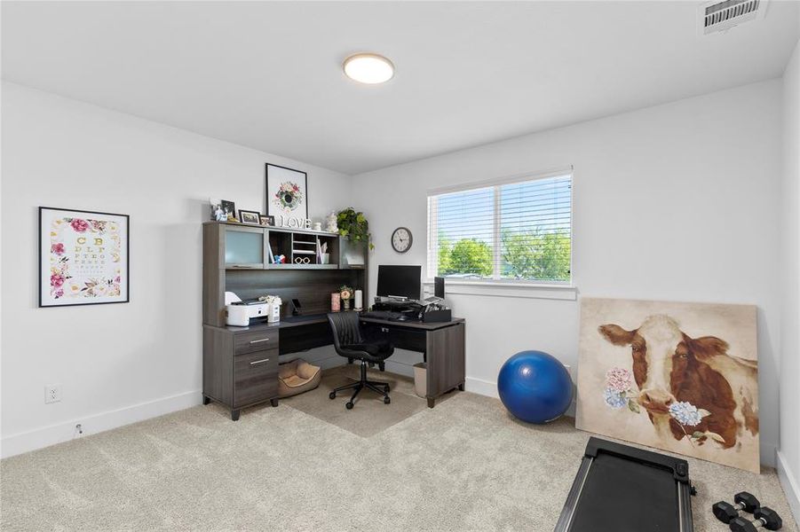 Furnished interior view inside a new home in North Square at Uptown, Celina (Image 11).