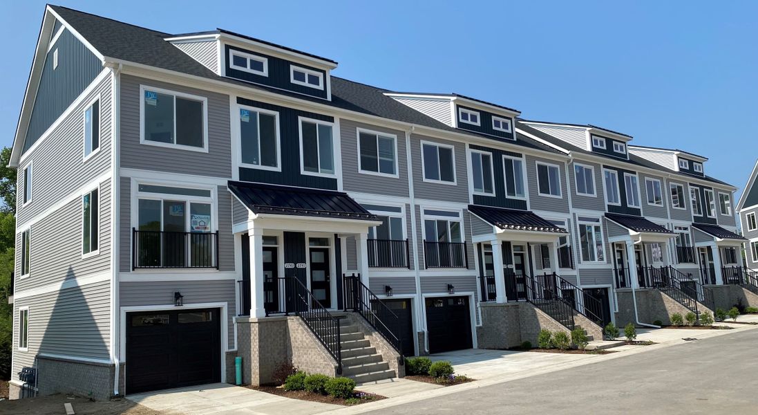 Representative exterior photo of a completed home built from the The Highbridge by Norfolk Homes in Bristol Ridge Townhomes, Ann Arbor, MI (Image 22).