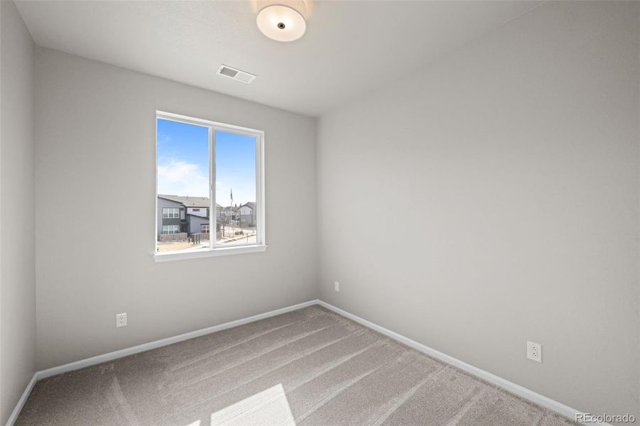 Spacious, unfurnished interior of a new home in Ralston Creek, Arvada (Image 31).
