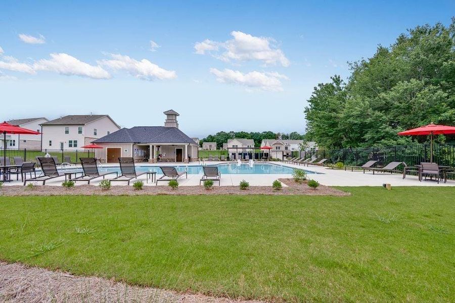 Front exterior of a new home in Windance Lake, Loganville, GA, highlighting curb appeal (Image 21). Front exterior of a new home in Windance Lake, Loganville, GA, highlighting curb appeal (Image 21).