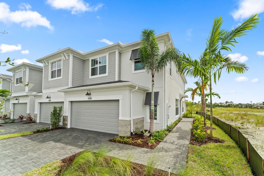 Exterior details and patio area of a home in Avila, Jensen Beach (Image 1).