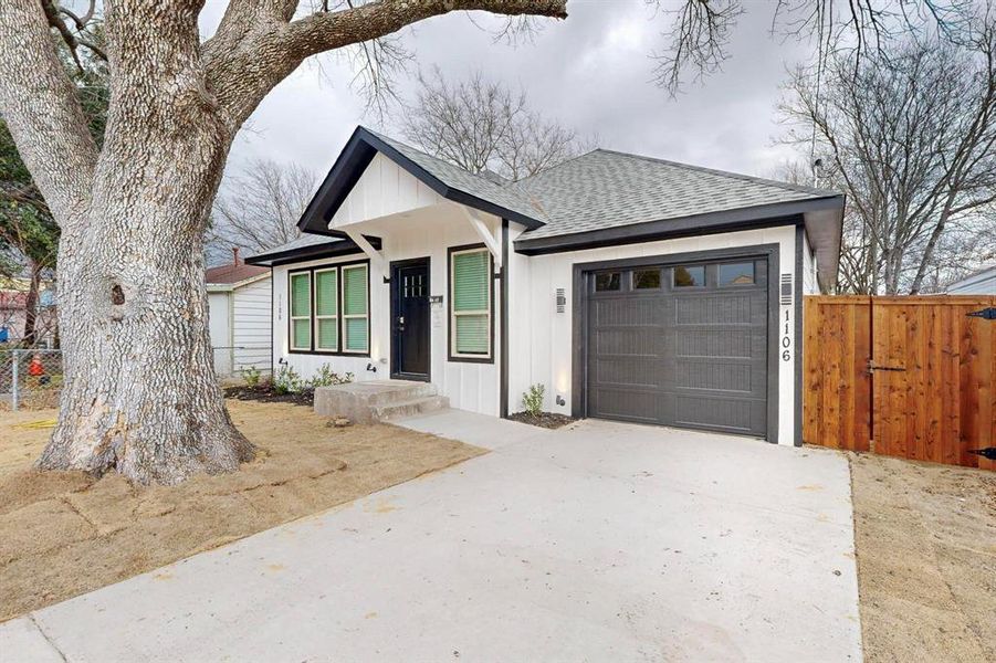 View of front of property with a garage