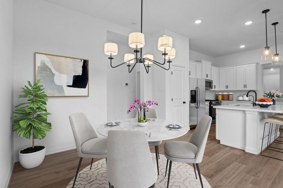 The dining area is a perfect blend of style and functionality, providing an inviting space for memorable meals and gatherings. The dining area is a perfect blend of style and functionality, providing an inviting space for memorable meals and gatherings.