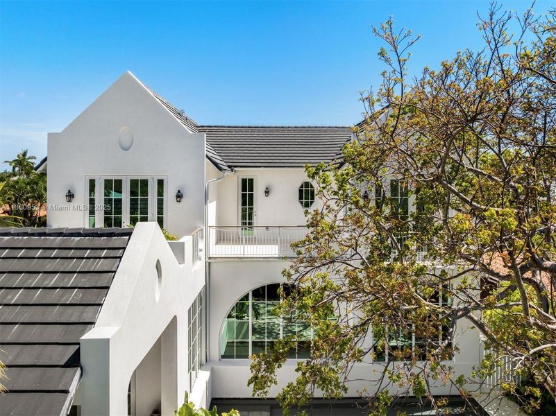 Front exterior of a new home in , Key Biscayne, FL, highlighting curb appeal (Image 2). Front exterior of a new home in , Key Biscayne, FL, highlighting curb appeal (Image 2).