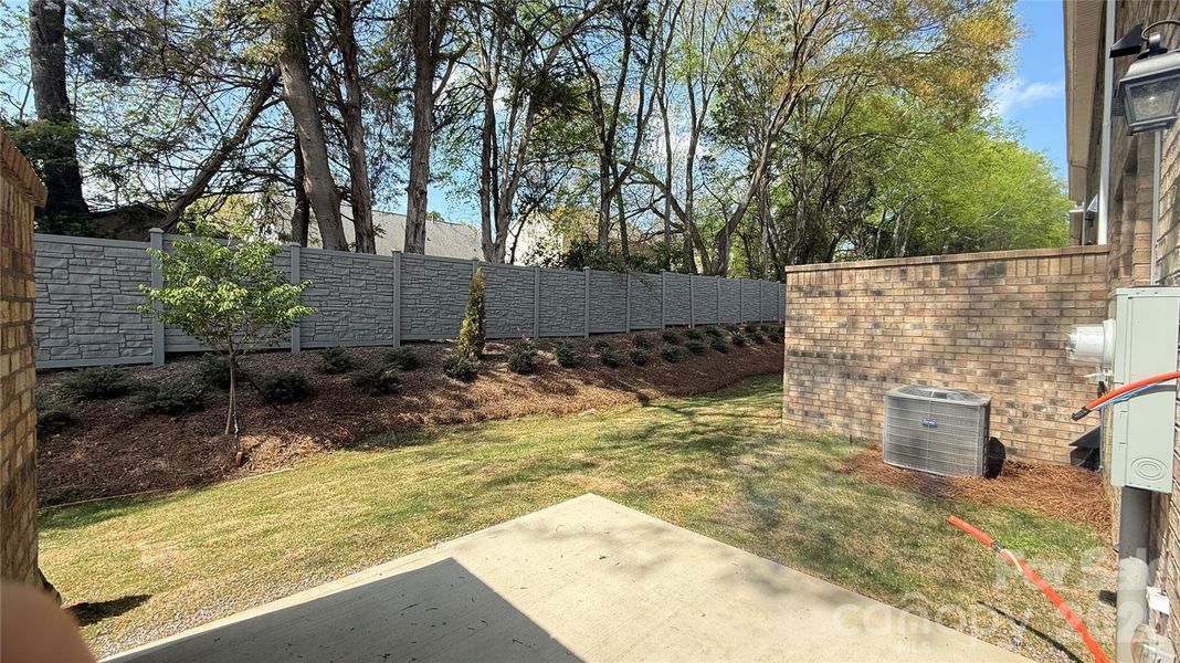 Exterior details and patio area of a home in The Townes at Wade Ardrey, Charlotte (Image 28).