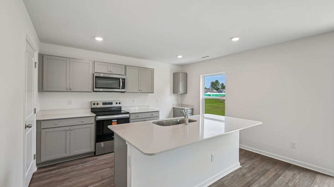 Furnished interior view inside a new home in Mangum Farms, Stem (Image 5).
