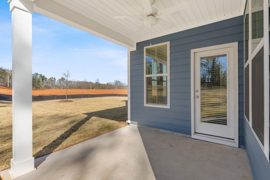 Exterior details and patio area of a home in Cottages at Lake Emory, Inman (Image 3).