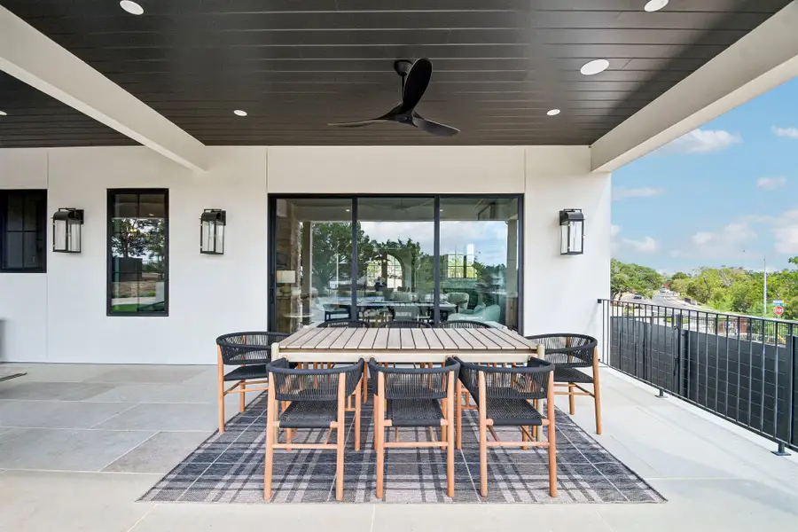 Exterior details and patio area of a home in The Overlook at Westlake, Austin (Image 28).