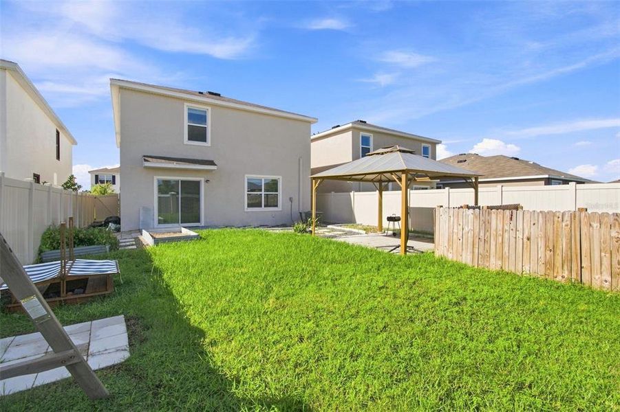 Exterior details and patio area of a home in , Wesley Chapel (Image 28).