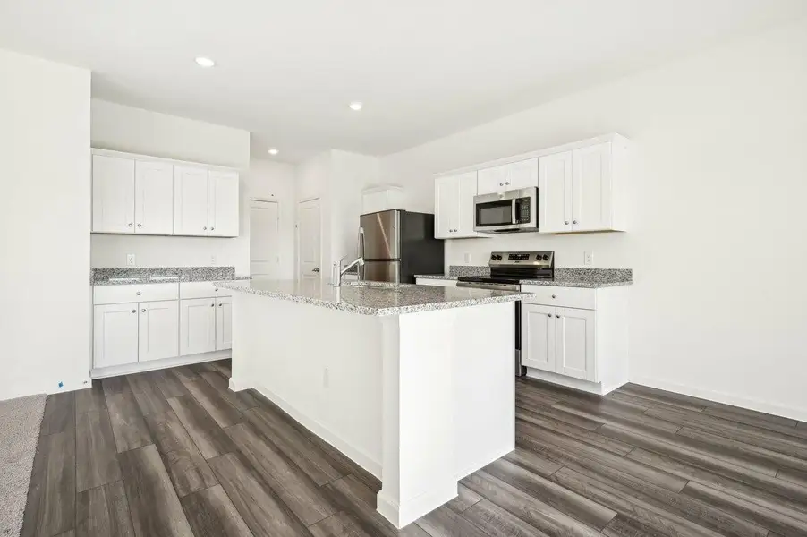 Furnished interior view inside a new home in Vacek Pointe, Richmond (Image 4).