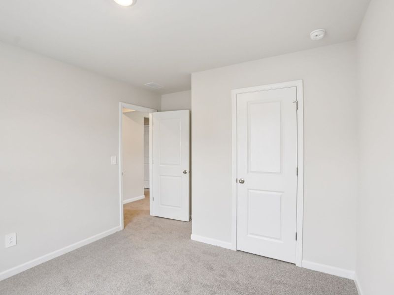 Spacious, unfurnished interior of a new home in Hawthorne Station, College Park (Image 18).