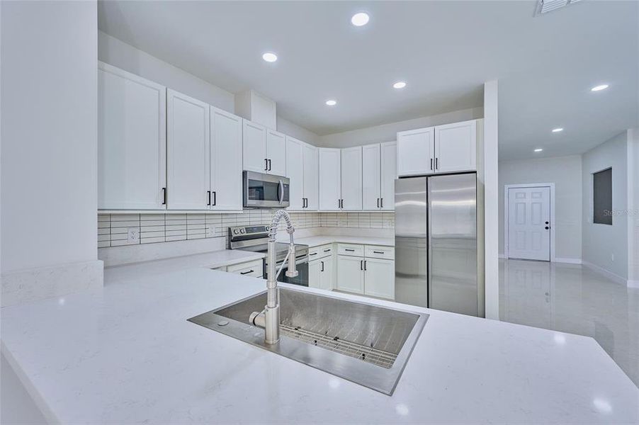 Furnished interior view inside a new home in , Indian Lake Estates (Image 12).