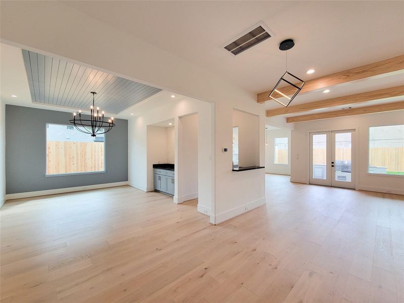 Formal dining, butler's pantry & living room view