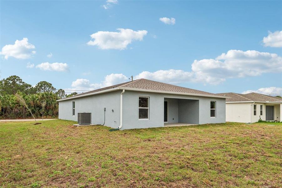 Exterior details and patio area of a home in Palm Bay Classic, Palm Bay (Image 18).