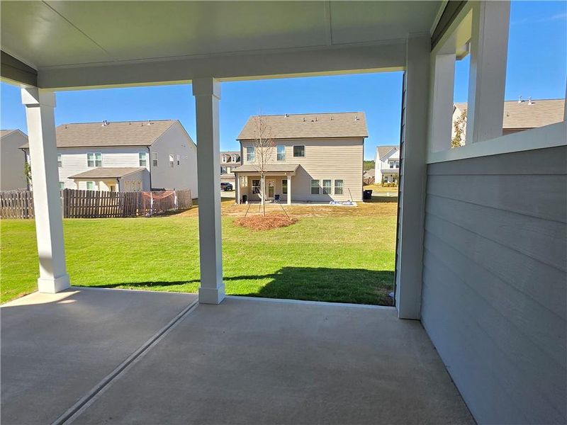 Exterior details and patio area of a home in Enclave at Logan Point, Loganville (Image 3).