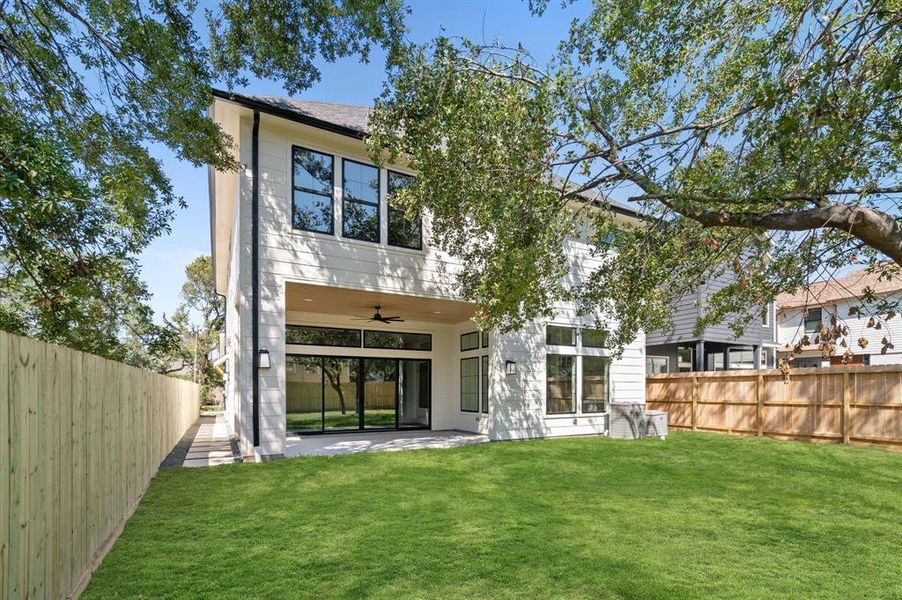 This expansive backyard is perfect for entertaining. Previous TOMO Homes project.