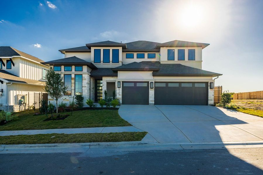 Front exterior of a new home in Easton Park 60', Austin, TX, highlighting curb appeal (Image 2).