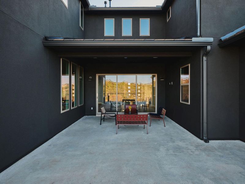 The patio features built-in speakers for the ultimate outdoor entertainer's retreat.