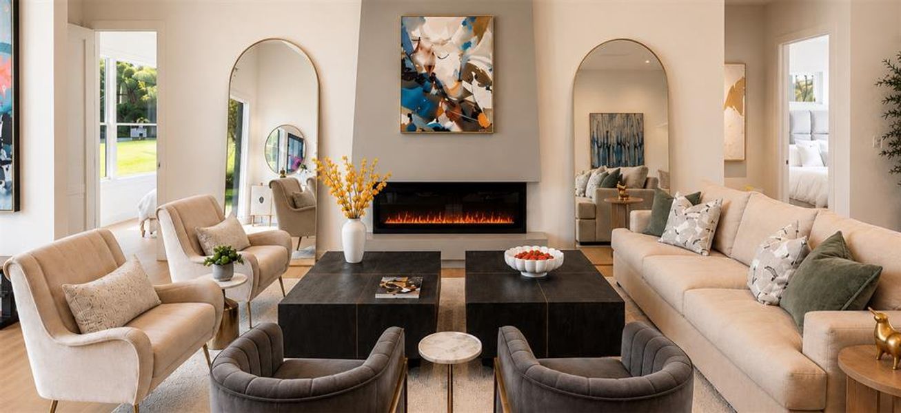 A great room in the center of it all with fireplace, fabulous view of the pool, and cozy gathering spot for nights in with the fam.