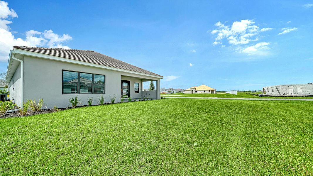 Exterior details and patio area of a home in Windward Real Estate and Homes for Sale in Sarasota, FL - Neal Communities, Lakewood Ranch (Image 27).